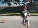 Strong runner focused like a laser beam at the Thanksgiving Turkey Run