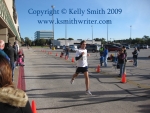 A runner sprinting for the finish line