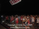 Racers get ready for a pre-dawn start at the USA Space City 10 Miler 2009